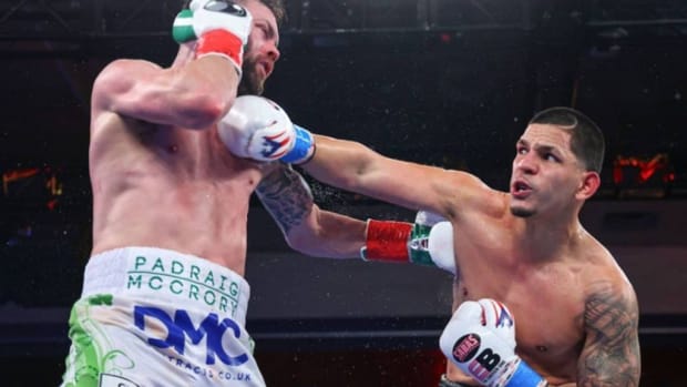 Edgar Berlanga(R) exchanges punches with Padraig McCrory during their bout. Berlanga defeated McCrory via powerful TKO in the sixth round and targets Canelo Alvarez. ED MULHOLLAND/MATCHROOM